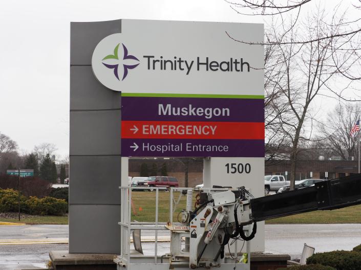 The new sign outside the former Mercy Health Muskegon reflects its new name, Trinity Health Muskegon. It is part of a massive rebranding effort that will rename eight Michigan hospitals.