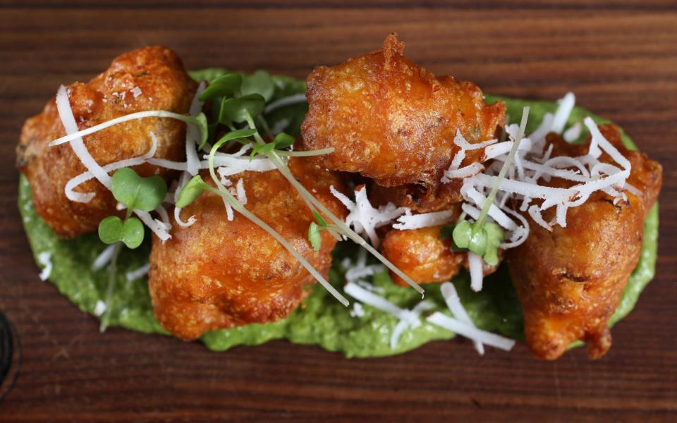  Skosh restaurant review in York, North Yorkshire. Picture shows cauliflower pakoras, herb and coconut chutney.  - Credit: Lorne Campbell/Guzelian