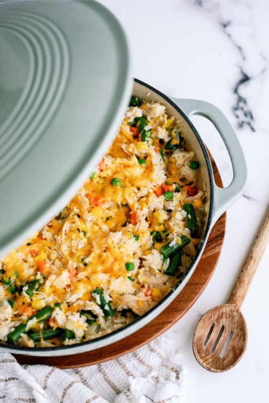 <p>With this creamy chicken and rice casserole skillet recipe, you can get all you need in one dish.</p><p><strong>Get the recipe: <a href="https://www.sixsistersstuff.com/recipe/creamy-chicken-and-rice-casserole-skillet-recipe/" rel="nofollow noopener" target="_blank" data-ylk="slk:Creamy Chicken and Rice Casserole;elm:context_link;itc:0;sec:content-canvas" class="link rapid-noclick-resp">Creamy Chicken and Rice Casserole</a></strong></p>