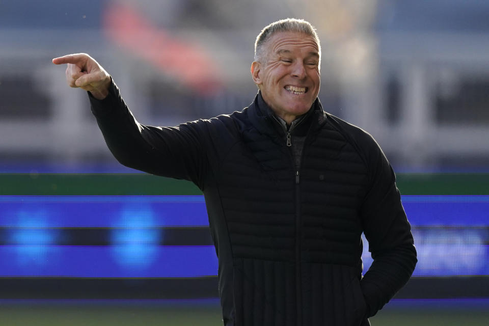 Sporting Kansas City manager Peter Vermes talks to his players during the first half of an MLS soccer match against the San Jose Earthquakes, Sunday, Nov. 22, 2020, in Kansas City, Kan. (AP Photo/Charlie Riedel)
