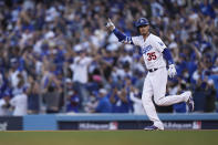 Los Angeles Dodgers center fielder Cody Bellinger reacts after hitting a three-run home run during the eighth inning in Game 3 of baseball's National League Championship Series against the Atlanta Braves Tuesday, Oct. 19, 2021, in Los Angeles. (AP Photo/Jae Hong)