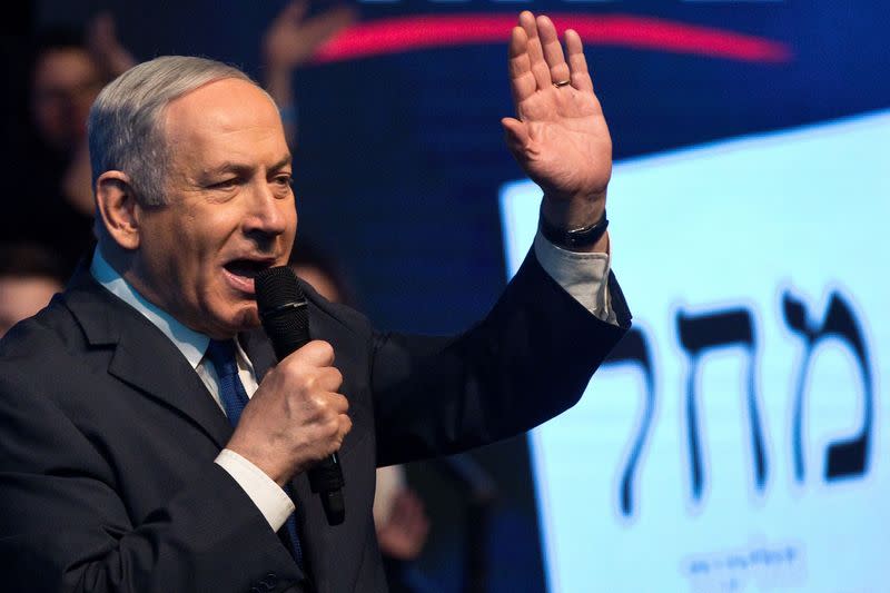 Israeli Prime Minister Benjamin Netanyahu speaks to his supporters as he campaigns at a Likud party rally ahead of the upcoming election, in Ramat Gan