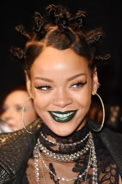 The dark green shade Rihanna wore to the iHeartRadio Music Awards in 2104 was another she picked out herself — texting Morales the night before to get her stamp of approval — and another done with eye pencil. This look was such a stand out hit with our beauty team, I actually ended up recreating it for our Halloween cheap challenge last year. Unsurprisingly, there aren’t a lot of moss green shades on the market, so I took a page from Morales’ makeup book and used an eyeliner all over my lips (Jason Merritt/Getty Images).