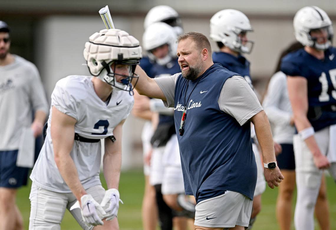 Penn State offensive coordinator Andy Kotelnicki yells to players during a spring practice on April 9.