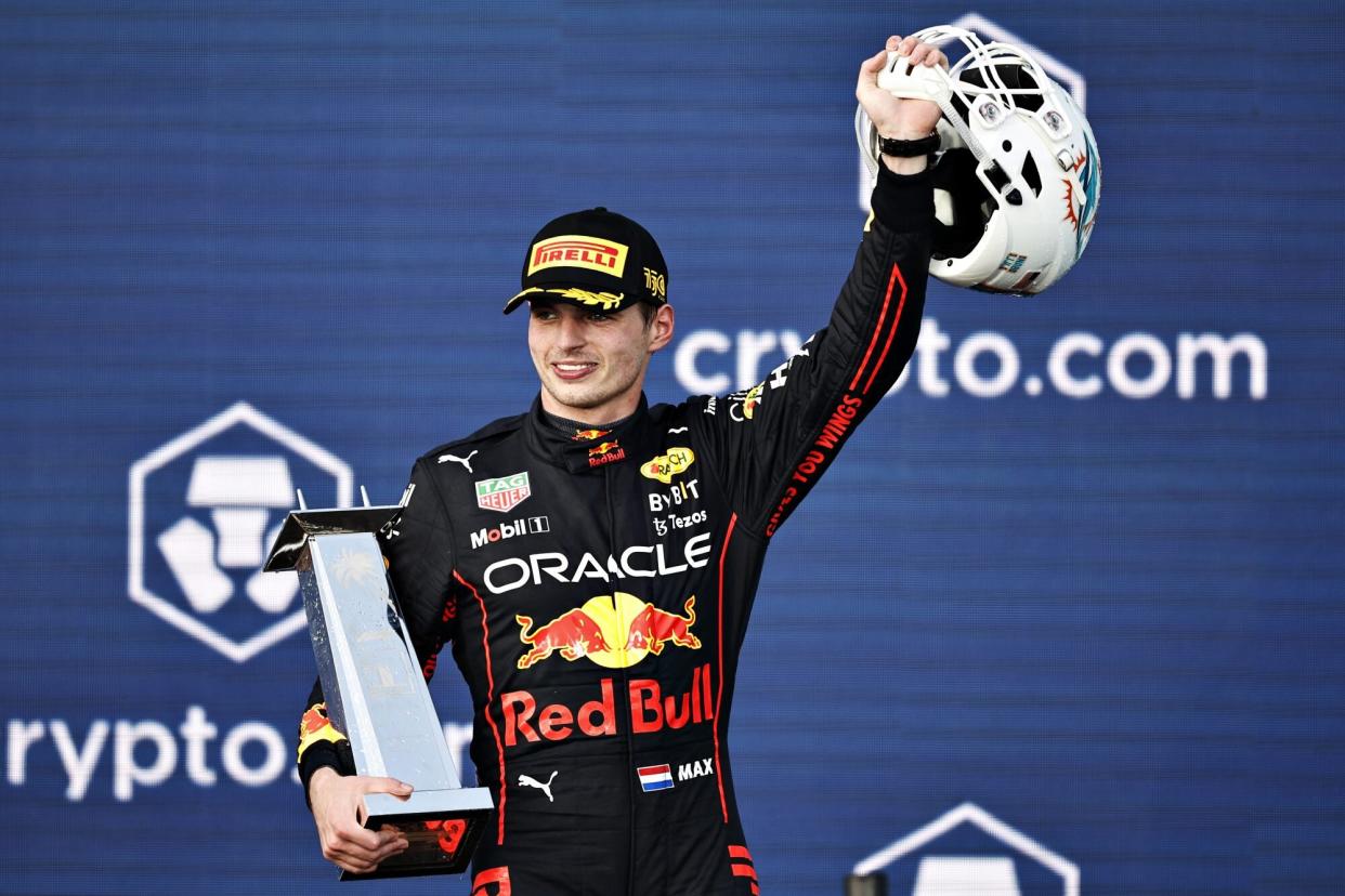 MIAMI, FLORIDA - MAY 08: Race winner Max Verstappen of the Netherlands and Oracle Red Bull Racing celebrates on the podium during the F1 Grand Prix of Miami at the Miami International Autodrome on May 08, 2022 in Miami, Florida. (Photo by Chris Graythen/Getty Images)