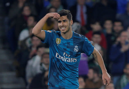 Soccer Football - La Liga Santander - Real Betis vs Real Madrid - Estadio Benito Villamarin, Seville, Spain - February 18, 2018 Real Madrid’s Marco Asensio celebrates scoring their first goal REUTERS/Jon Nazca