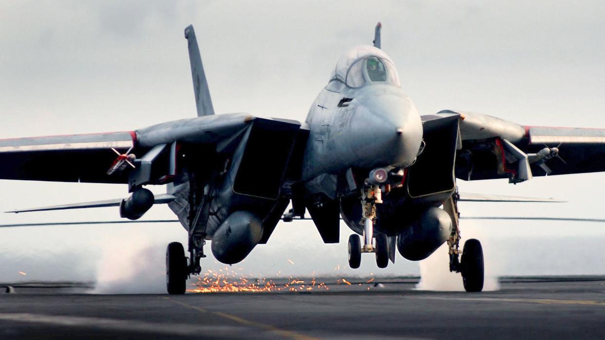 F-14 Tomcat landing on a carrier.