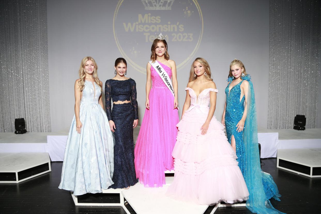 Trinity Horstman, of Onalaska, center, was crowned Miss Wisconsin’s Teen during Friday night’s competition at Oshkosh West High School's Alberta Kimball Civic Auditorium. Also pictured are, from left, Morgan Eberhardt, of Green Bay, third runner-up; Carly Doome, of Oak Creek, first runner-up; Ruby Marti, of Wisconsin Rapids, second runner-up; and Kellyse Lutzow, of Beloit, fourth runner-up. Horstman now advances to Miss America’s Teen competition in December or January.