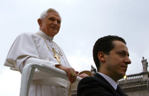 Pope Benedict XVI's then-butler Paolo Gabriele (right) arrives with the pontiff for a weekly general audience at St Peter's square in 2006