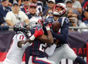 <p>New England Patriots cornerback Stephon Gilmore (24) intercepts an end zone pass with help from teammate defensive back Eric Rowe (25) intended for Houston Texans wide receiver Vyncint Smith (17) in the second quarter at Gillette Stadium. Mandatory Credit: David Butler II-USA TODAY Sports </p>