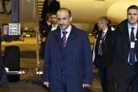 Ahmad al-Jarba, leader of Syria's opposition National Coalition arrives for the Geneva 2 talks on Syria, at Geneva International airport January 21, 2014. REUTERS/Salvatore Di Nolfi/Pool