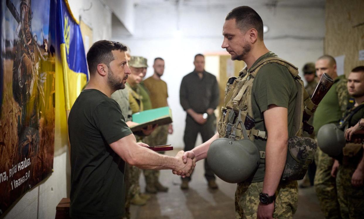 <span>Volodymyr Zelenskiy presents an award to a Ukrainian soldier during his visit to Pokrovsk.</span><span>Photograph: Ukrainian Presidential Press Service/Reuters</span>
