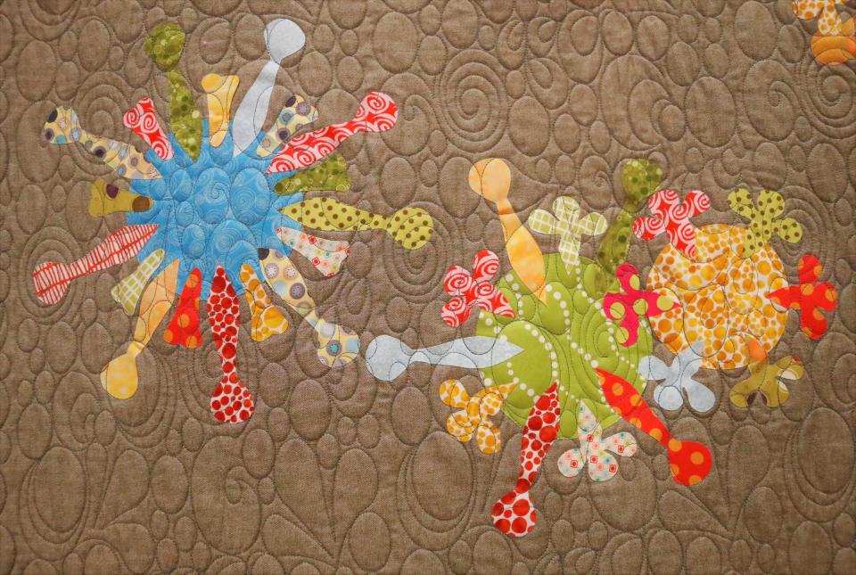 This Covid quilt was created by Natalie Caldwell and won a first-place ribbon in the recent Sun Country Quilters show in Red Bluff. She said she designed a quilt "that looked like the Covid virus seen on so many news broadcasts." Caldwell said "it was meant to be used to nurse you back, so to speak."