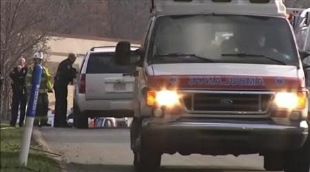 Emergency personnel gather outside of Franklin Regional High School after reports of stabbing injuries in Murrysville, Pennsylvania April 9, 2014, in this still taken from video courtesy of WPXI. REUTERS/WPXI/Handout via Reuters