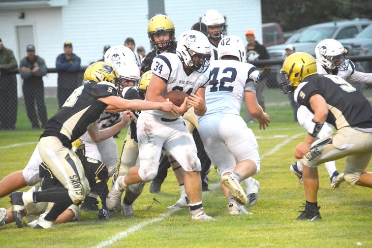 Sault High's Ryan LaPlaunt (34) runs the ball during a game at St. Ignace last season. LaPlaunt is among the EUP area players and three Sault athletes who are scheduled to compete in the U.P. All-Star Football Game at Marquette on June 25.