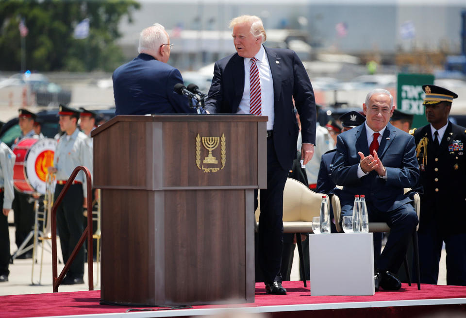 U.S. President Donald Trump shakes hands with Israel’s President Reuven Rivlin