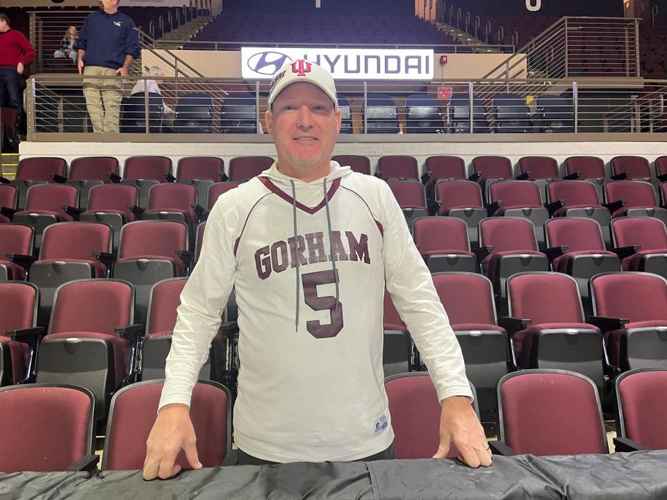 Mackenzie Holmes’ high school coach, Laughn Berthiaume, wears her Gorham jersey ahead of IU's visit to Portland to play Maine, Nov. 30, 2023.