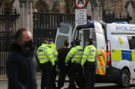 LONDON - UNITED KINGDOM - JANUARY 6: British police arrest demonstrator protesting government's lockdown decision imposed to stem coronavirus (Covid-19) pandemic outside the House of Commons in London, United Kingdom on January 6, 2021. (Photo by Tayfun Salci/Anadolu Agency via Getty Images)