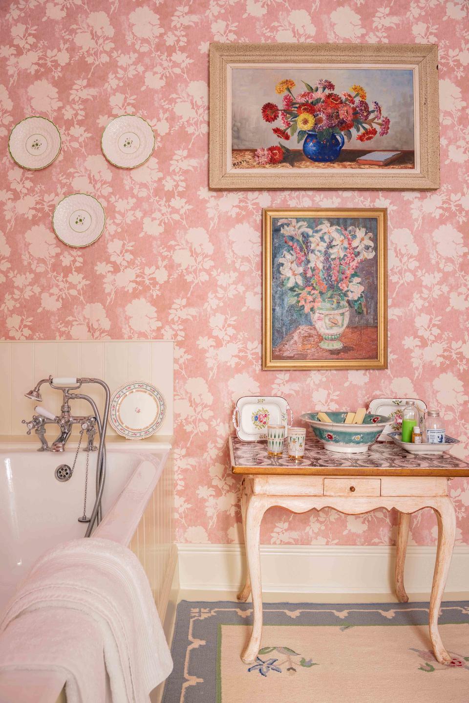 <p> For a country cottage look, opt for a pretty wallpaper and keep it simple by choosing a two tone design – then it can act as a background for vintage paintings and decorative plates.  </p> <p> This Flowerberry Pink wallpaper is from a selection designed by Penny Morrison. Its floral silhouettes sit perfectly on the slightly worn pink background.  </p>