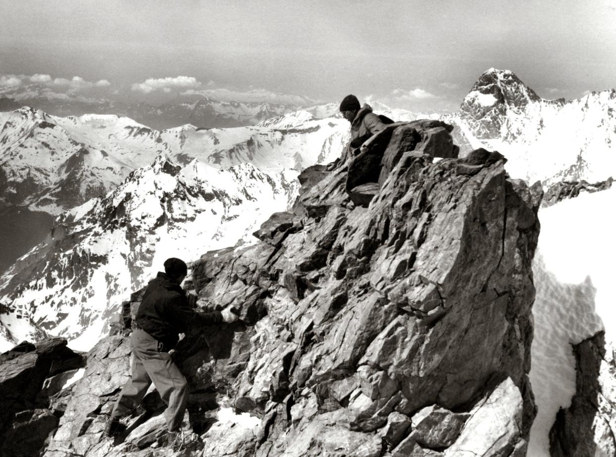 Chris Brasher at the top and Roger Bannister climbing at the summit of Finsteraarhorn in 1955
