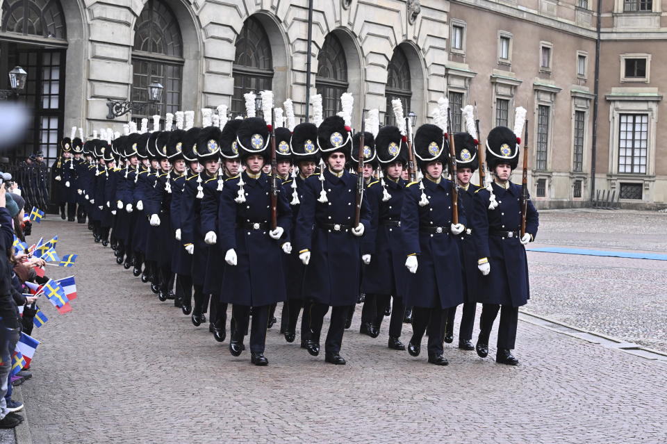 The Grenadier Guards of the Life Guards at the Royal Palace in Stockholm, Sweden, Tuesday Jan. 30, 2024. France’s President Emmanuel Macron started a two-day state visit in Stockholm during which he will meet Swedish prime minister, Ulf Kristersson, and the country’s monarch, King Carl XVI Gustaf. (Claudio Bresciani/TT via AP)