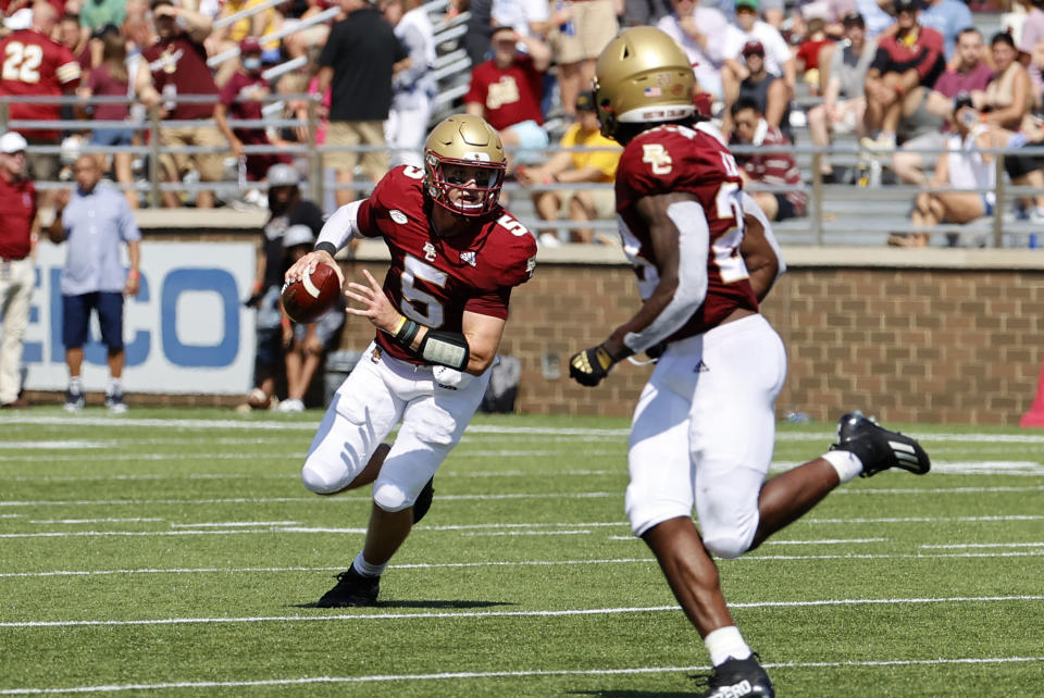 CHESTNUT HILL, MA - SEPTEMBER 04: Boston College Eagles quarterback Phil Jurkovec (5) rolls from the pocket during a game between the Boston College Eagles and the Colgate University Raiders on September 4, 2021, at Alumni Stadium in Chestnut Hill, Massachusetts. (Photo by Fred Kfoury III/Icon Sportswire via Getty Images)