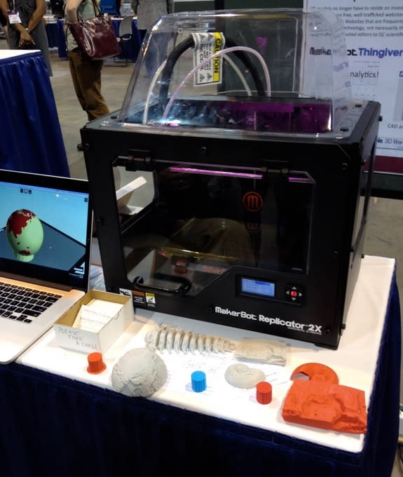 Iowa State's MakerBot Replicator printing the Earth on Oct. 28 during the Geological Society of America meeting in Denver.