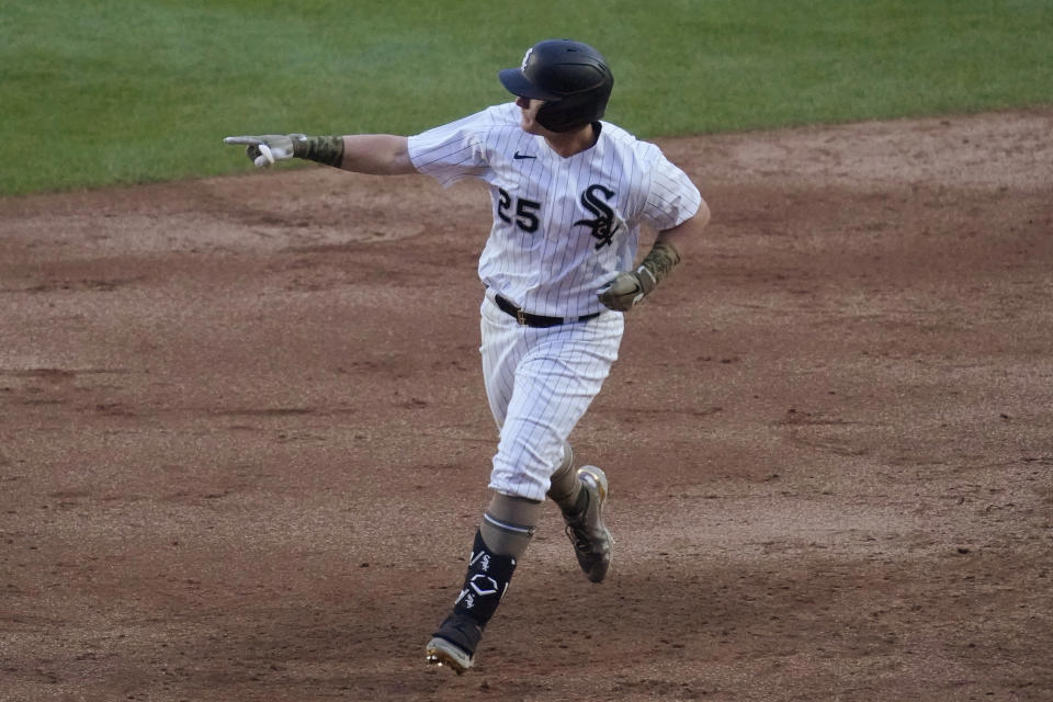 Chicago White Sox's Andrew Vaughn points as he runs the bases after hitting a two-run home run during the second inning in the second baseball game of a doubleheader against the Kansas City Royals, Friday, May 14, 2021, in Chicago. (AP Photo/Nam Y. Huh)