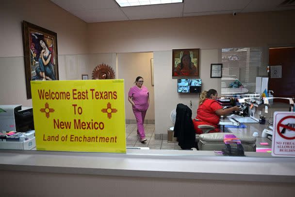 PHOTO: A sign welcoming patients from East Texas is displayed in the waiting area of the Women's Reproductive Clinic, which provides legal medication abortion services, in Santa Teresa, N.M., on June 15, 2022. (Robyn Beck/AFP via Getty Images)