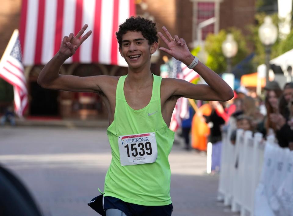 Julian Pomales wins the male overall ME STRONG 5K in DeLand, Saturday, Feb. 4, 2023.
