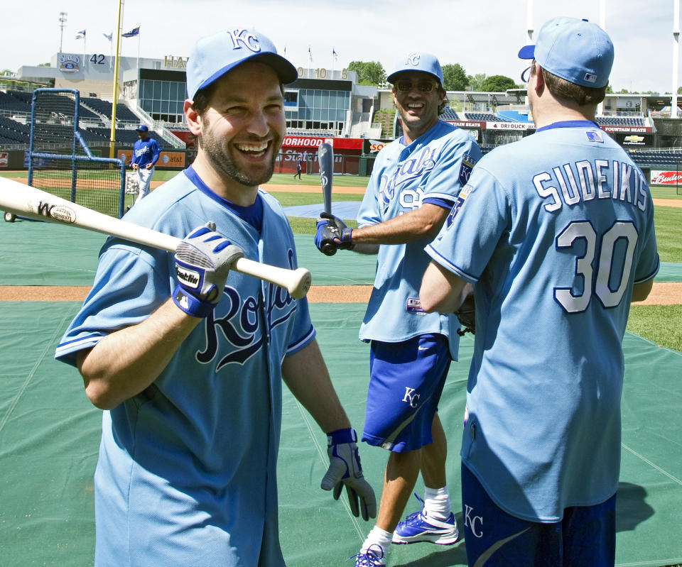 Comedian Paul Rudd, left, put on a Kansas City Royals shirt and took a little batting practice before the Royals team took the field for its own practice before the game against the Detroit Tigers at Kauffman Stadium in Kansas City, Missouri, Friday, June 4, 2010. (Photo by John Sleezer/Kansas City Star/MCT/Sipa USA)