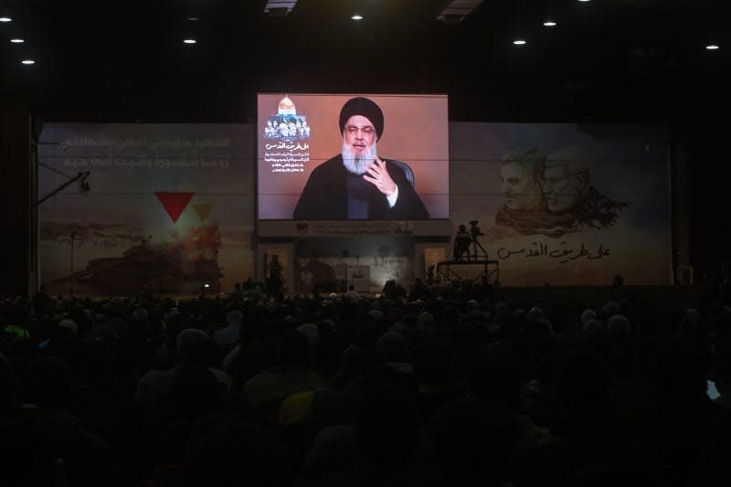 Secretary of pro-Iranian Hezbollah Hassan Nasrallah addresses supporters through a televised speech to mark the 4th anniversary of the assassination of Abu Mahdi al-Mohandes, the deputy head of Iraq's Hashd al-Shaabi militia, and Iranian Quds Force commander Qasem Soleiman in Beirut southern suburb. Marwan Naamnai/dpa