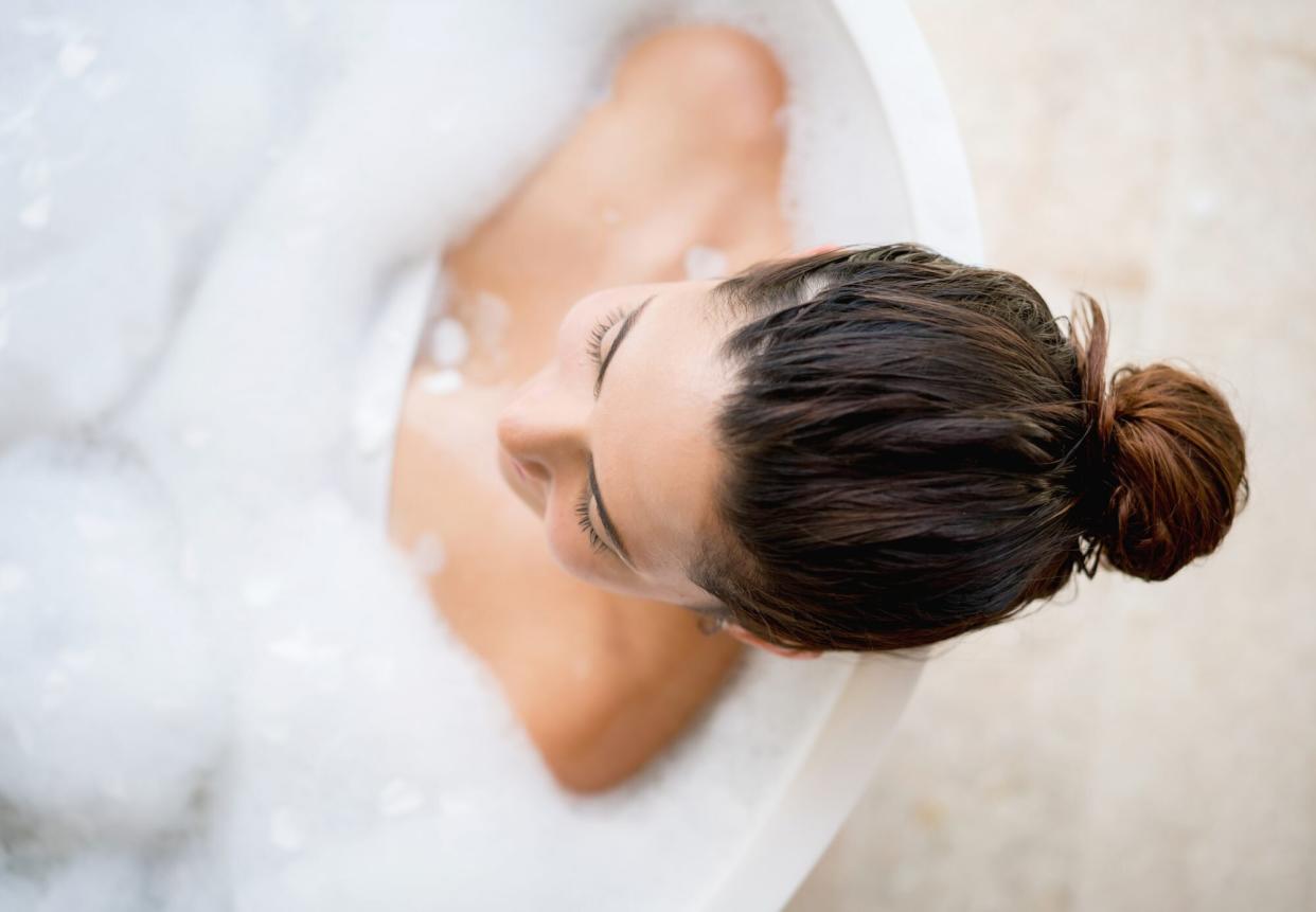 Brunette Woman Taking Bubble Bath