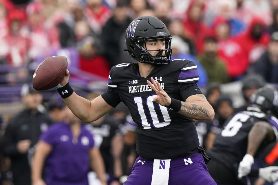 Northwestern quarterback Brendan Sullivan throws a pass during the first half of an NCAA college football game against Ohio State, Saturday, Nov. 5, 2022, in Evanston, Ill. (AP Photo/Nam Y. Huh)