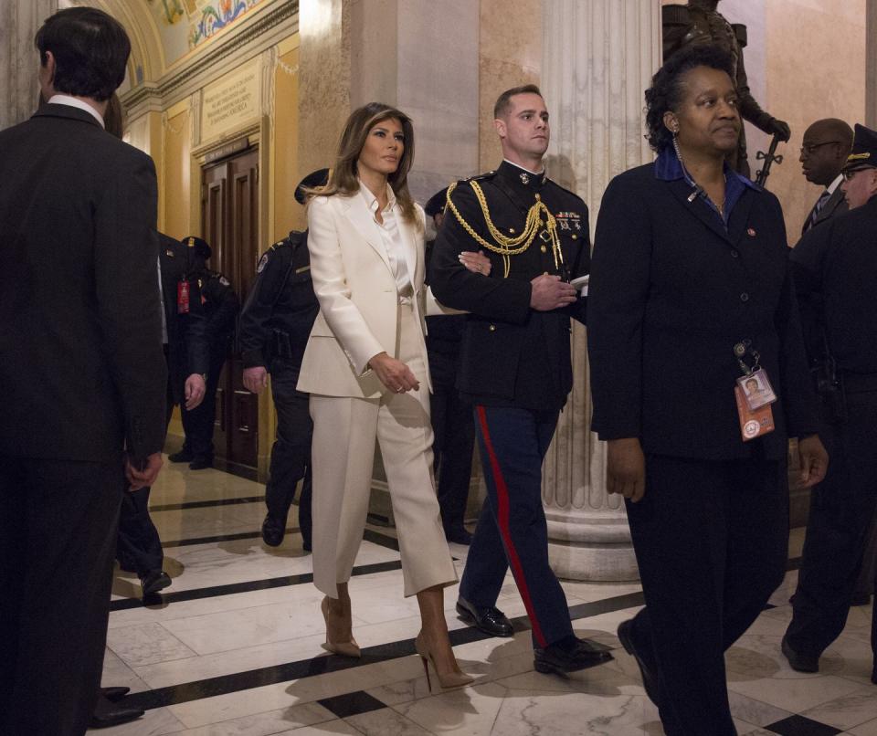 <p>When Trump showed up to her husband’s first State of the Union address in an ivory Dior pantsuit, the internet immediately began debating what it meant. Was she, as some Twitter users <a href="https://twitter.com/kerrysolivia/status/958532934281187329" rel="nofollow noopener" target="_blank" data-ylk="slk:speculated;elm:context_link;itc:0;sec:content-canvas" class="link ">speculated</a>, showing her disdain for the Democrats’ black outfits supporting #MeToo? Or was her suit a <a href="https://twitter.com/siobhanehughes/status/958520405026918400" rel="nofollow noopener" target="_blank" data-ylk="slk:form of protest;elm:context_link;itc:0;sec:content-canvas" class="link ">form of protest</a> too, given that less than a week ago, white was the symbol of solidarity with #MeToo and #TimesUp at the Grammys? Much like 2017’s now-infamous <a href="https://twitter.com/jenncasey/status/958531823469907968" rel="nofollow noopener" target="_blank" data-ylk="slk:pussy bow blouse;elm:context_link;itc:0;sec:content-canvas" class="link ">pussy bow blouse</a>, we’ll probably never know.</p>
