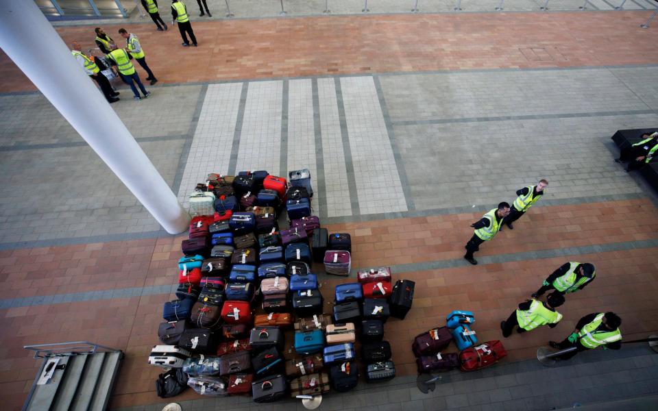 baggage luggage heathrow travel chaos - Jamie Lorriman