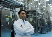 CEO of the Serum Institute of India Adar Poonawalla poses for a picture inside a lab at the Serum Institute of India, Pune