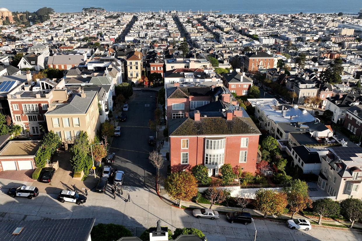 In an aerial view, San Francisco police officers and F.B.I. agents gather in front of the home of U.S. Speaker of the House Nancy Pelosi (D-CA) on October 28, 2022 in San Francisco, California.