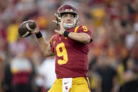 FILE - In this Nov. 2, 2019 file photo, Southern California quarterback Kedon Slovis throws a pass during the first half of an NCAA college football game against Oregon in Los Angeles. Slovis returns s quarterback for his sophomore season in November. (AP Photo/Kyusung Gong, File)