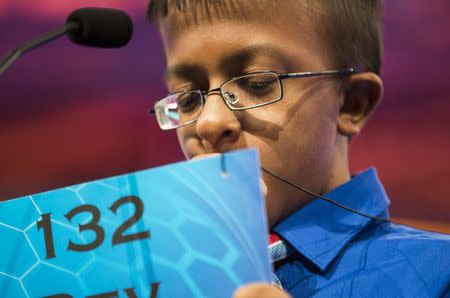 Dev Jaiswal, of Jackson, Mississippi, ponders the word "bacchius" during the final round of the 88th annual Scripps National Spelling Bee at National Harbor, Maryland May 28, 2015. REUTERS/Joshua Roberts