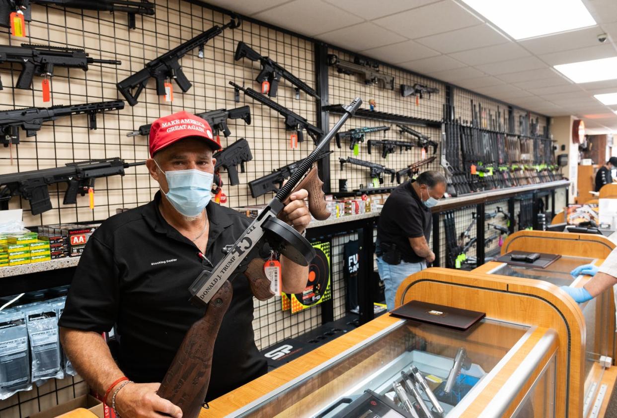 <span class="caption">Most people buy guns for protection.</span> <span class="attribution"><a class="link " href="https://www.gettyimages.com/detail/news-photo/gun-shop-employee-wearing-a-protective-face-mask-shows-guns-news-photo/1264376890?adppopup=true" rel="nofollow noopener" target="_blank" data-ylk="slk:(Mike Pont/Getty Images News via Getty Images);elm:context_link;itc:0;sec:content-canvas">(Mike Pont/Getty Images News via Getty Images)</a></span>