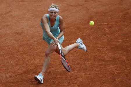 Tennis - French Open - Roland Garros - Eugenie Bouchard of Canada vs Timea Bacsinszky of Switzerland - Paris, France - 26/05/16. Timea Bacsinsky returns the ball. REUTERS/Pascal Rossignol