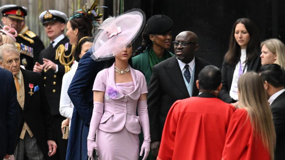 london, england may 06 katy perry and edward enninful arrive at westminster abbey ahead of the coronation of king charles iii and queen camilla on may 06, 2023 in london, england the coronation of charles iii and his wife, camilla, as king and queen of the united kingdom of great britain and northern ireland, and the other commonwealth realms takes place at westminster abbey today charles acceded to the throne on 8 september 2022, upon the death of his mother, elizabeth ii photo by jeff spicergetty images