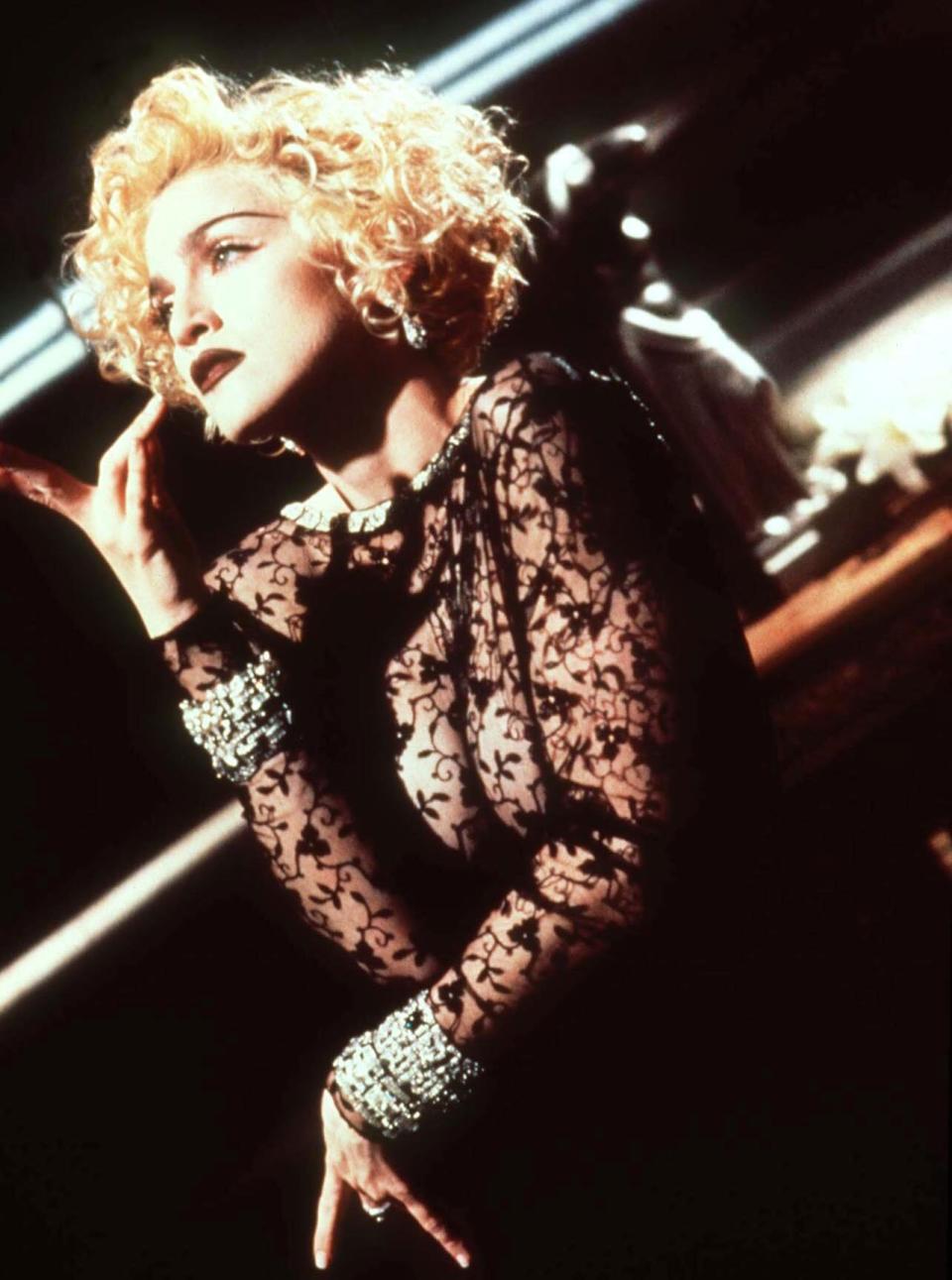 Editorial use only Mandatory Credit: Photo by Shutterstock (170053a) MADONNA - 'VOGUE' Madonna - 1990