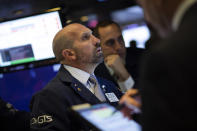 Trader James Denaro works at the New York Stock Exchange, Wednesday, Sept. 18, 2019. The Federal Reserve is expected to announce its benchmark interest rate later in the day. (AP Photo/Mark Lennihan)