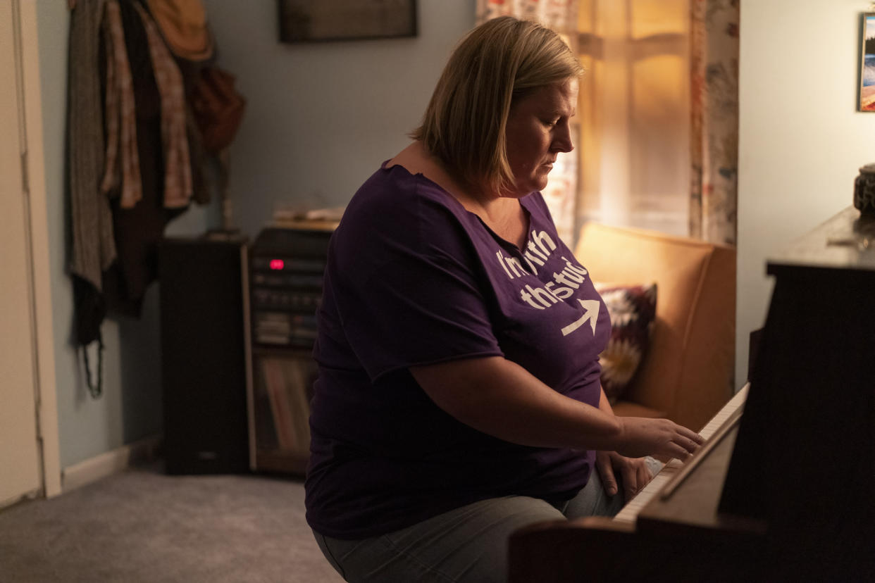 Bridget Everett as Sam, at the piano.                          