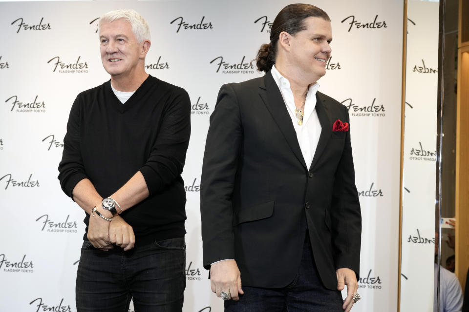 Fender Musical Instruments Corp. Chief Executive Andy Mooney, left, and Fender President for Asia-Pacific Edward Cole attend the opening ceremony of its Tokyo store Thursday, June 29, 2023. Fender, the guitar of choice for some of the world’s biggest stars from Jimi Hendrix to Eric Clapton, is opening what it calls its “first flagship store” in its 77-year history. (AP Photo/Eugene Hoshiko)