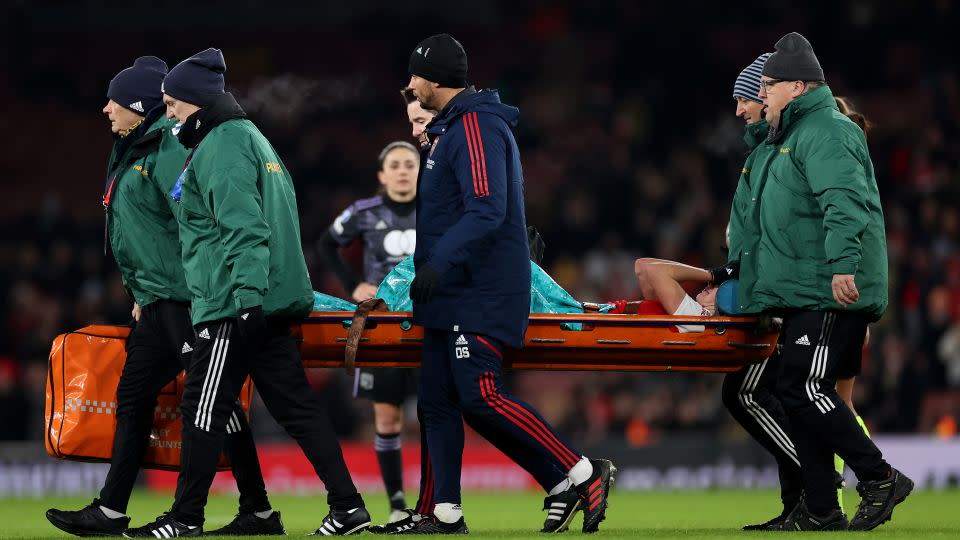 Miedema is stretchered off during a Women's Champions League match in December 2022.  - Ryan Pierse/Getty Images