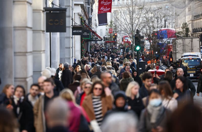 FILE PHOTO: Shoppers head to the Black Friday sales in London