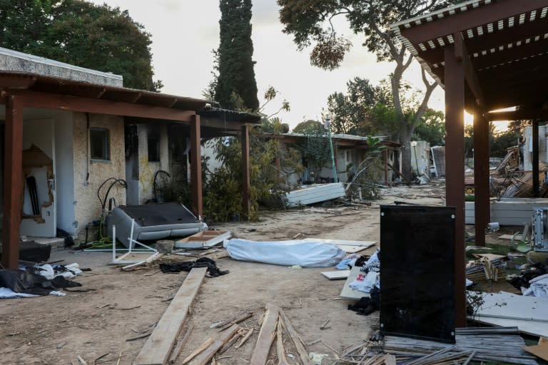 More than 60 people were killed during the Hamas attack on Kfar Aza kibbutz (GIL COHEN-MAGEN)